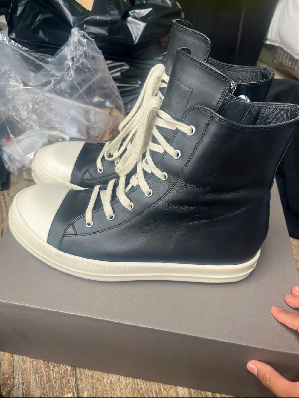 Rick Owens Black Leather High-Top Boat Sneakers with White Toe Caps